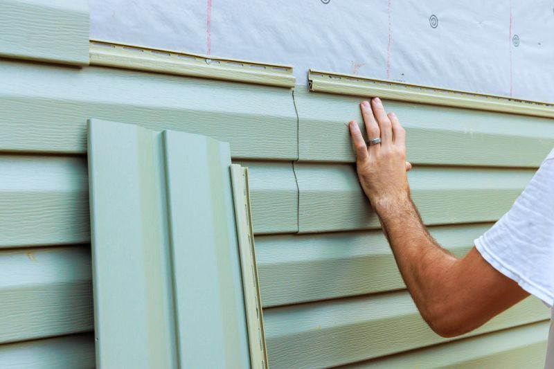 Professional Installing Vinyl Siding